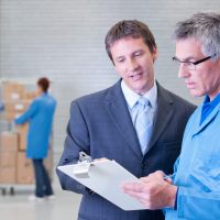 business-professionals-reviewing-documents-inside-2026-01-11-09-50-48-utc
